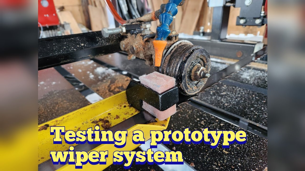 Check out this sawmill bandsaw blade wiper system