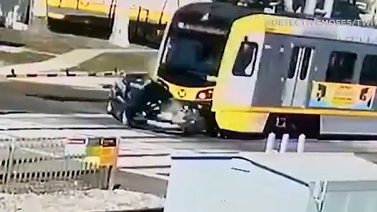 Train smashes car after driver turns onto Metro Blue Line tracks in South LA | ABC7