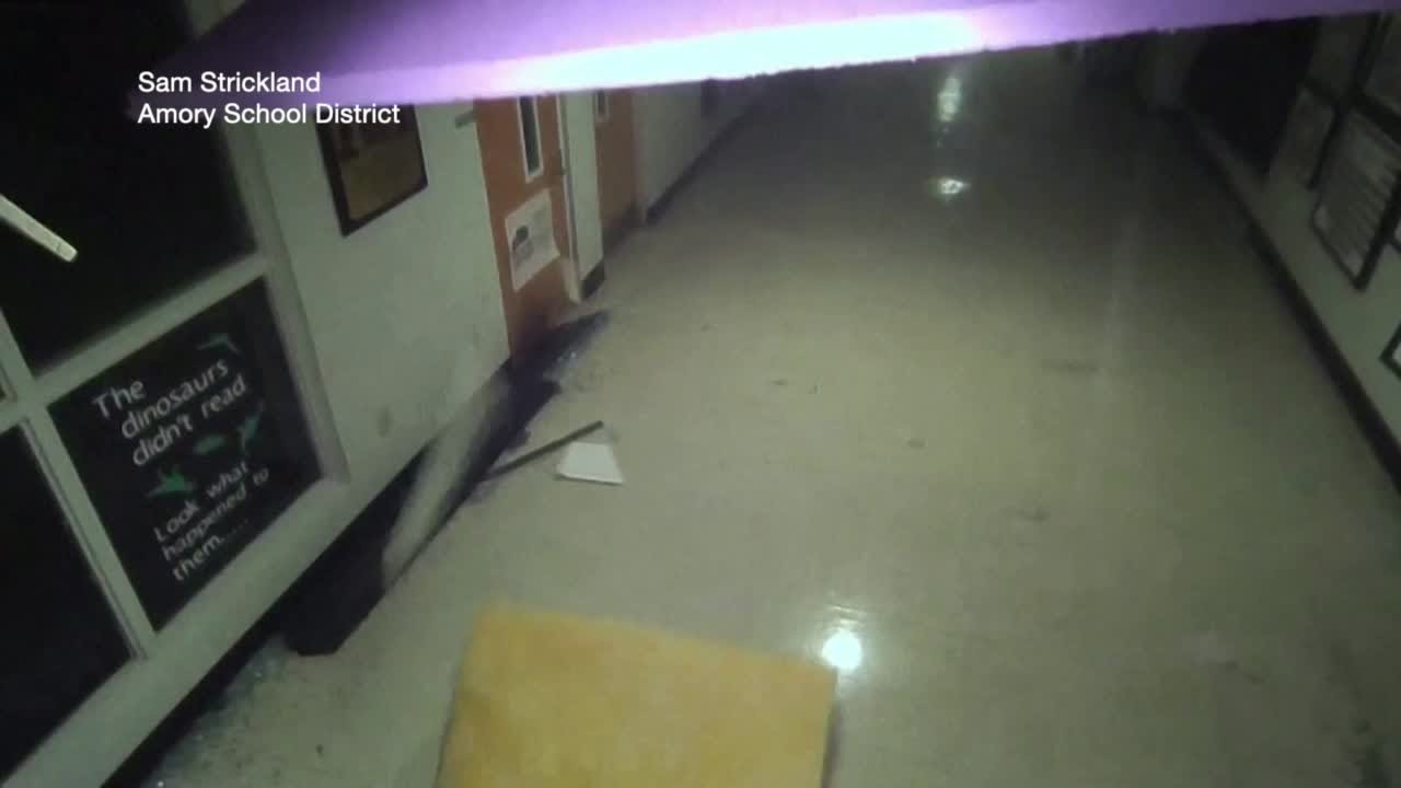 Surveillance footage shows tornado tearing through Amory High School