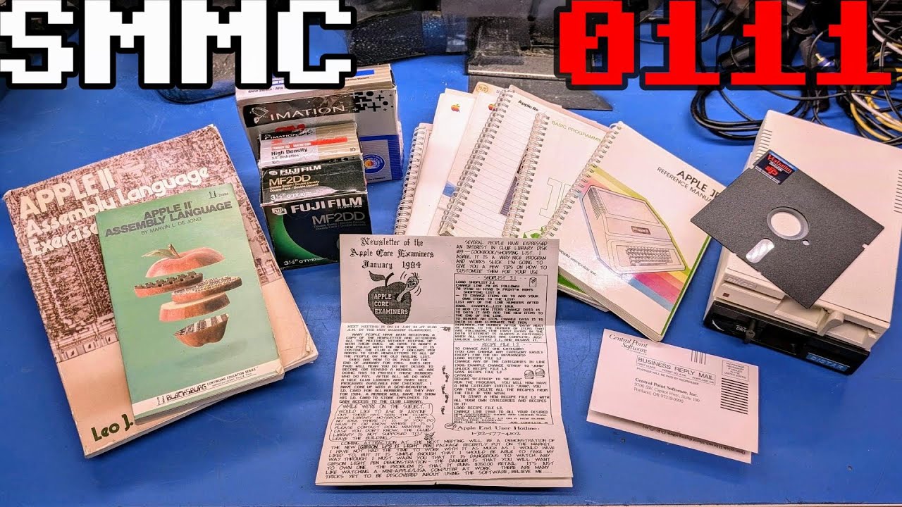 0111 Apple II goodies including clone floppy drives and rare books