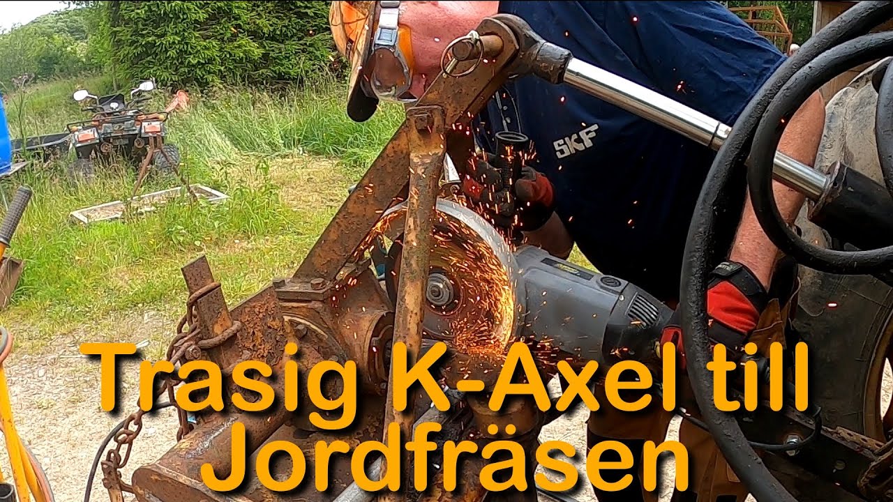 Kört sönder K-Axeln till Jordfräsen (Avsliten kraftaxel )