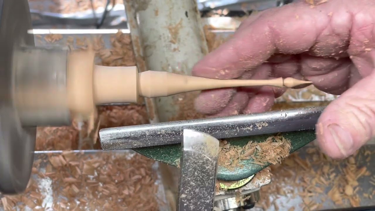 Turning a finial in real time.