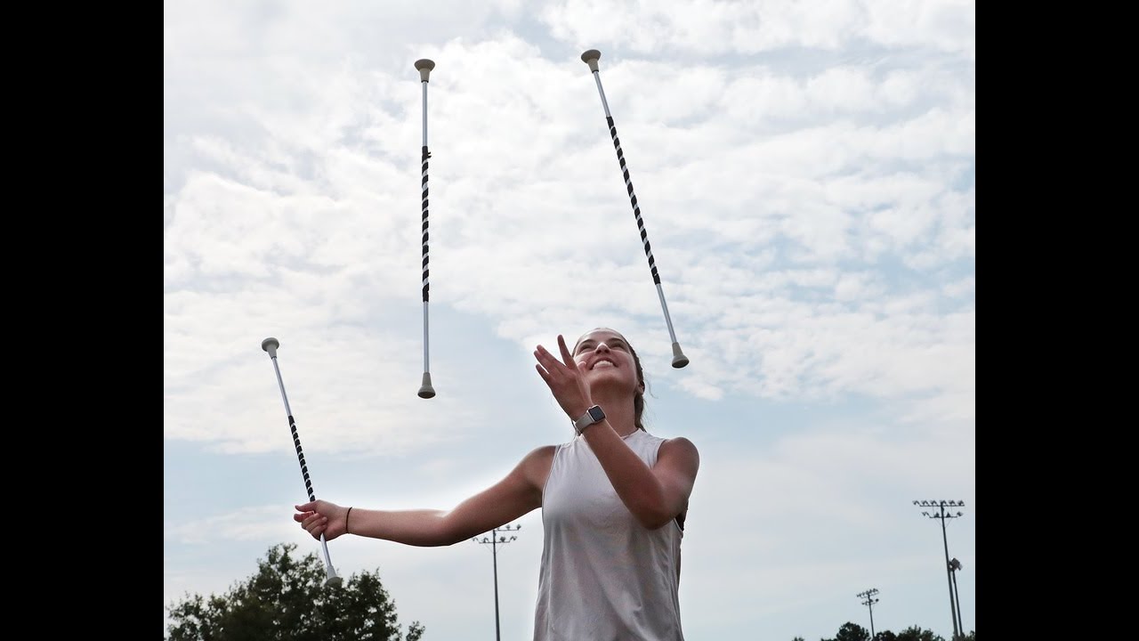 Teen baton twirler shines in Clover High School band