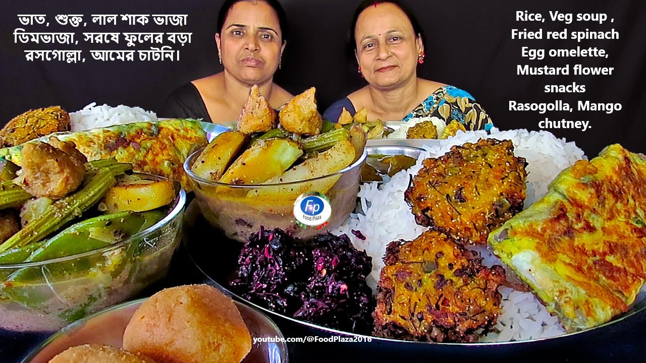 EATING SHOW RICE SHUKTO EGGS OMELETTE MUSTARD FLOWERS PAKORA FRIED RED SPINACH MANGO PICKLE RASGULLA