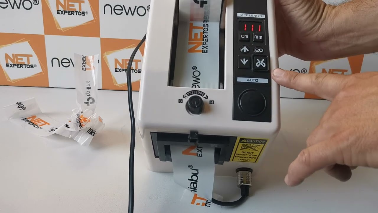 video manual dispensador y cortador de cinta de embalaje.