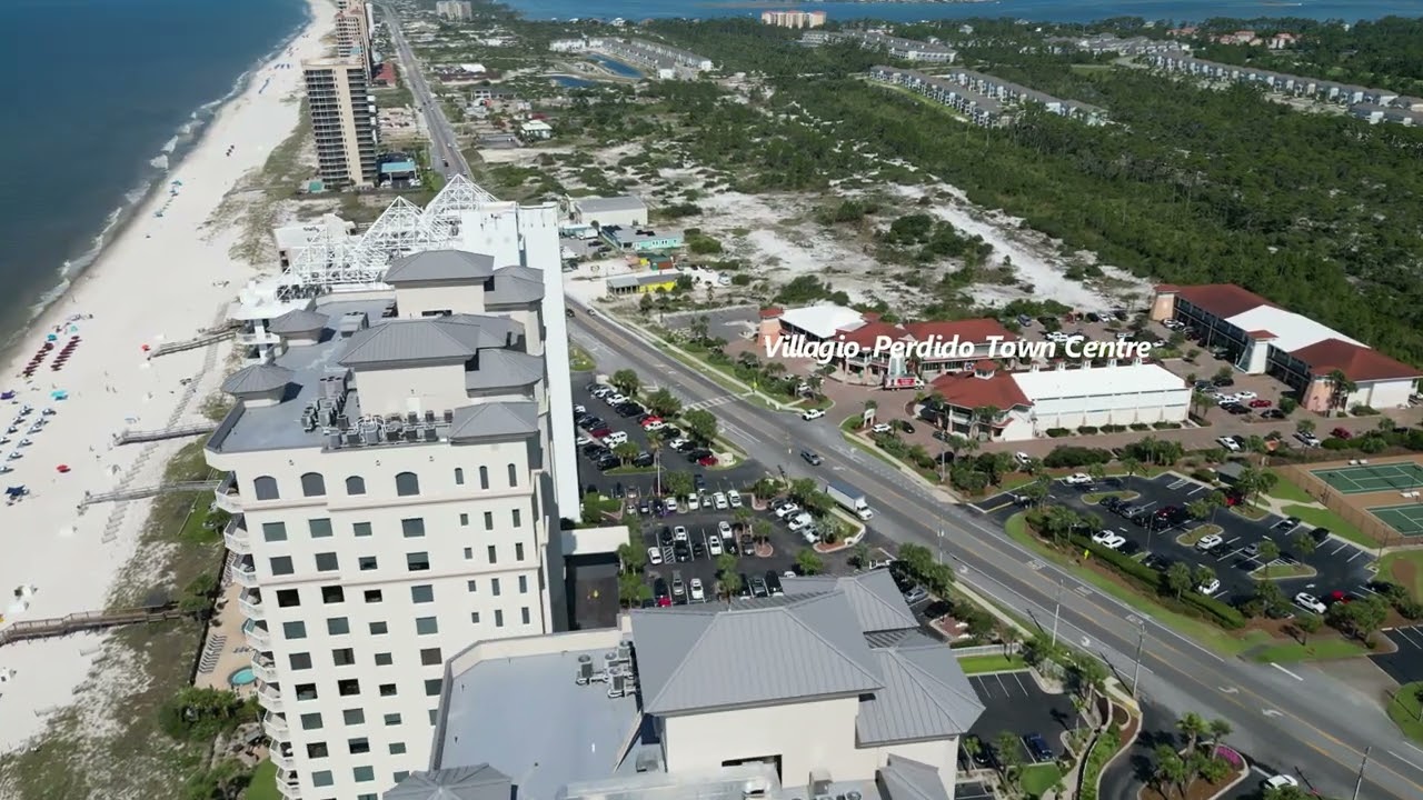 Perdido Key Florida - Drone flight near Villagio Perdido Town Centre shopping plaza and beach.