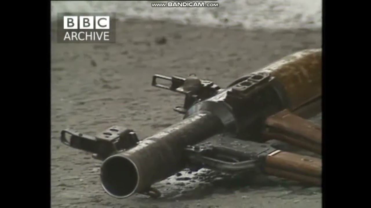 IRA Belfast brigade ambush Grosvenor Road RUC base with AK47s & an RPG-7, injure 10 RUC 2 July 1990