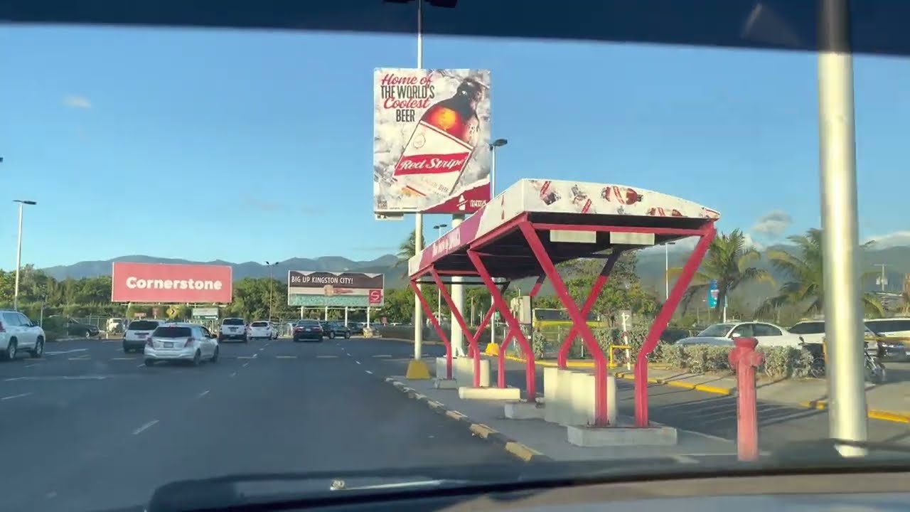 Drive from Norman Manley International Airport to Altamont Court Hotel - Kingston Jamaica 10-2-23