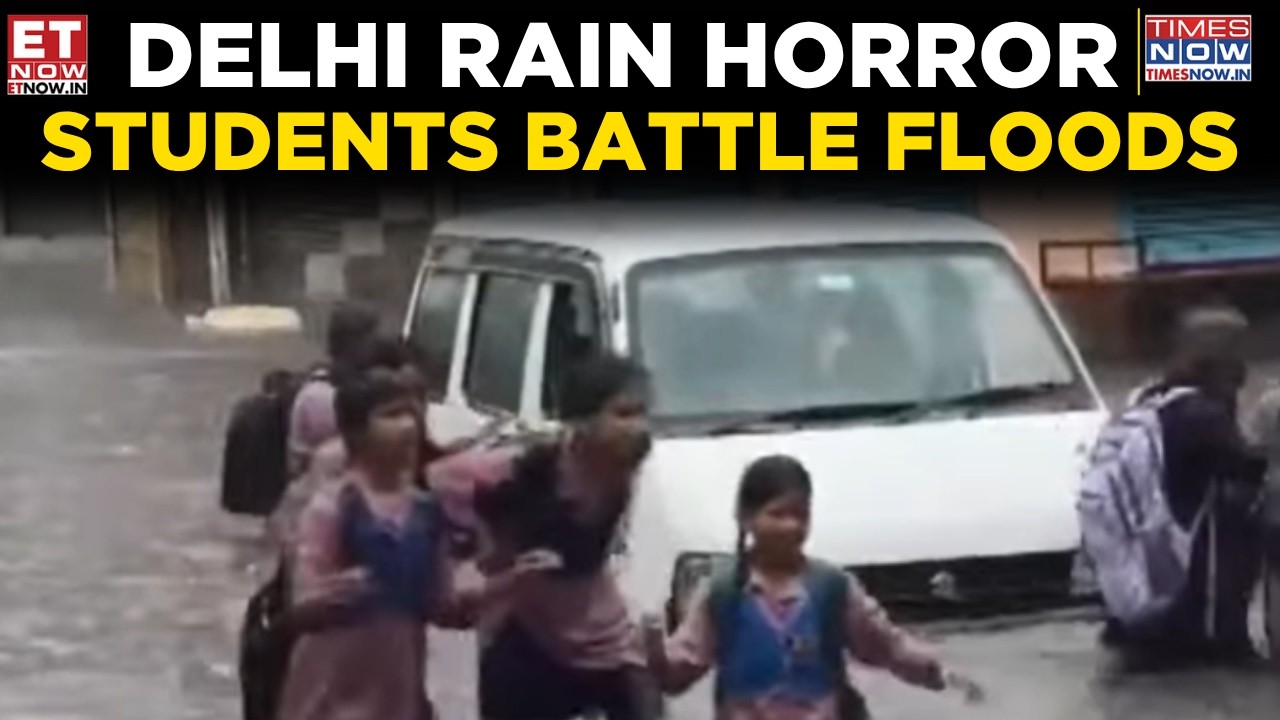 Delhi Rain Fury: Streets Submerged, Students Wading Through Waist-Deep Water | WATCH | ET Now