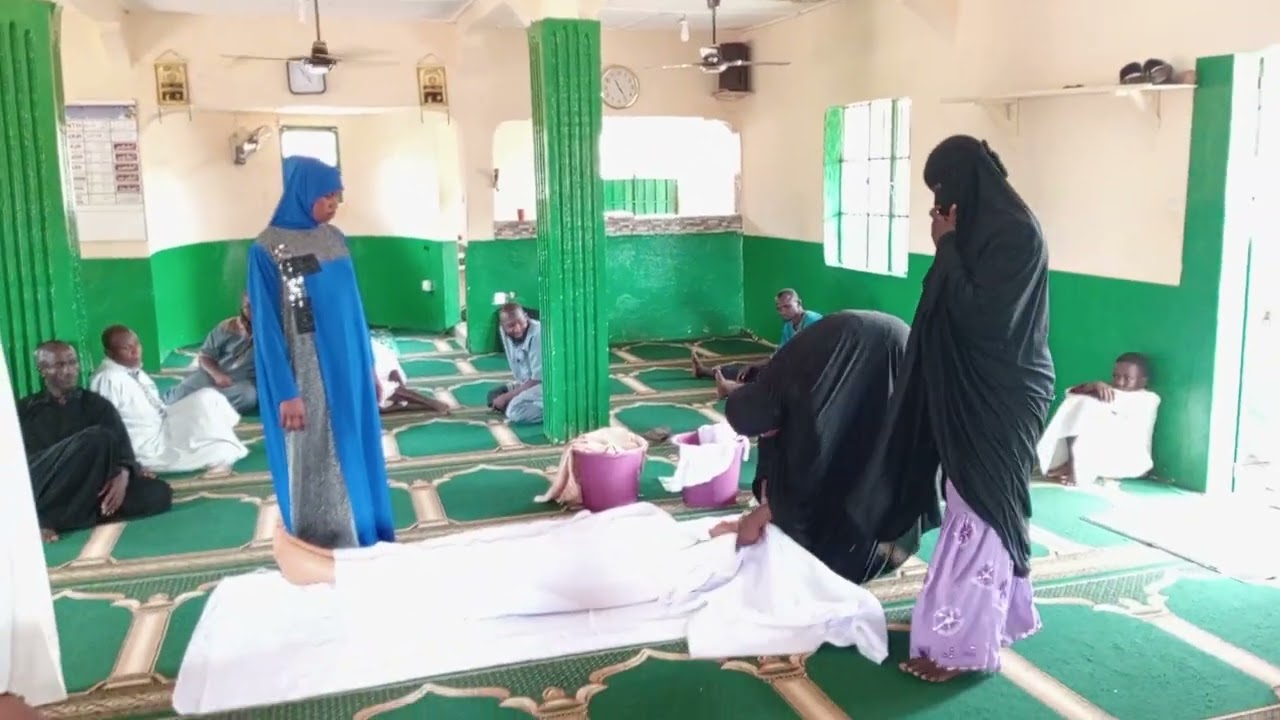 Shrouding the dead in the Mandinka language by Sh ba dembo Samateh. تكفين الميت بلغة المندنكية