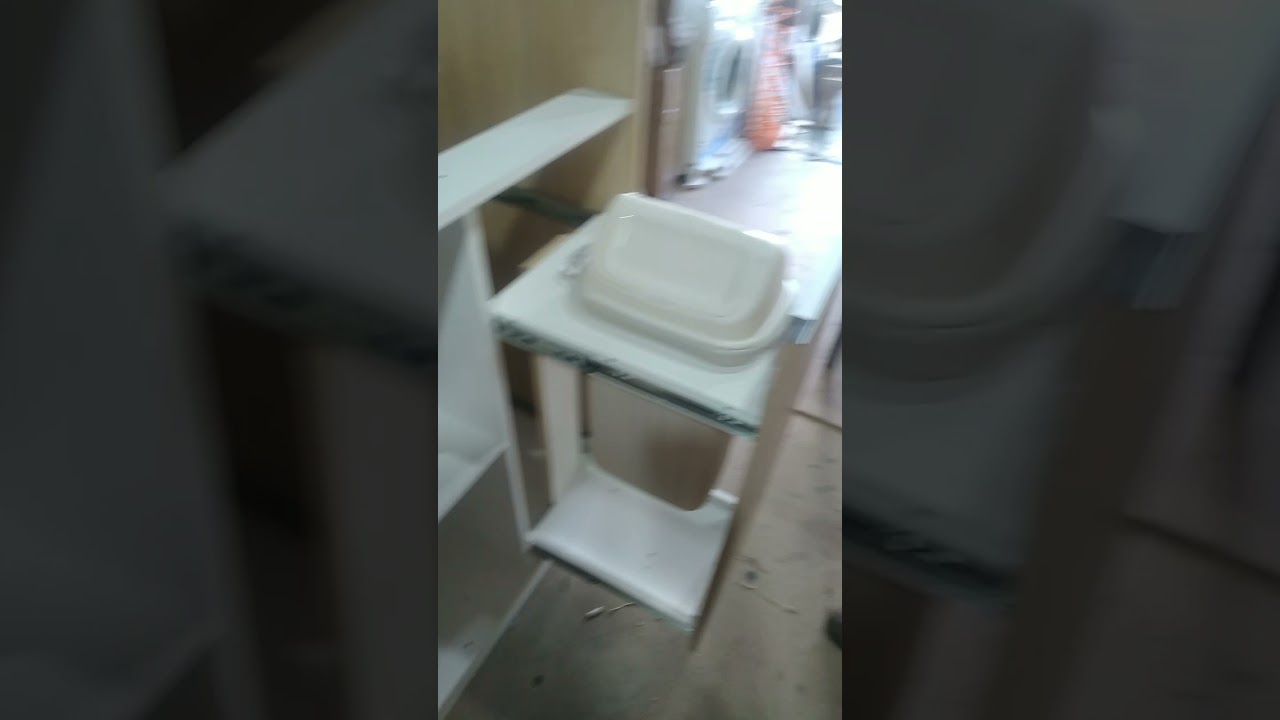 Práctico mueble para guardar el tacho de basura.