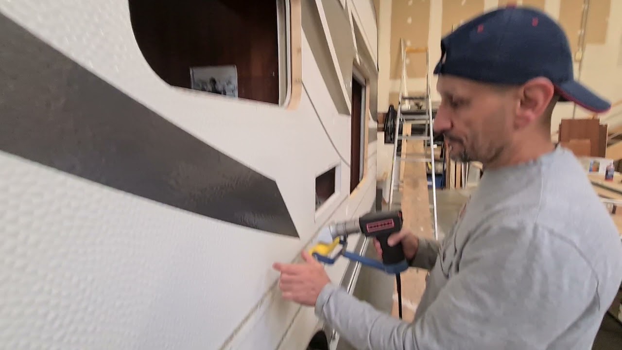 pose autocollant caravane