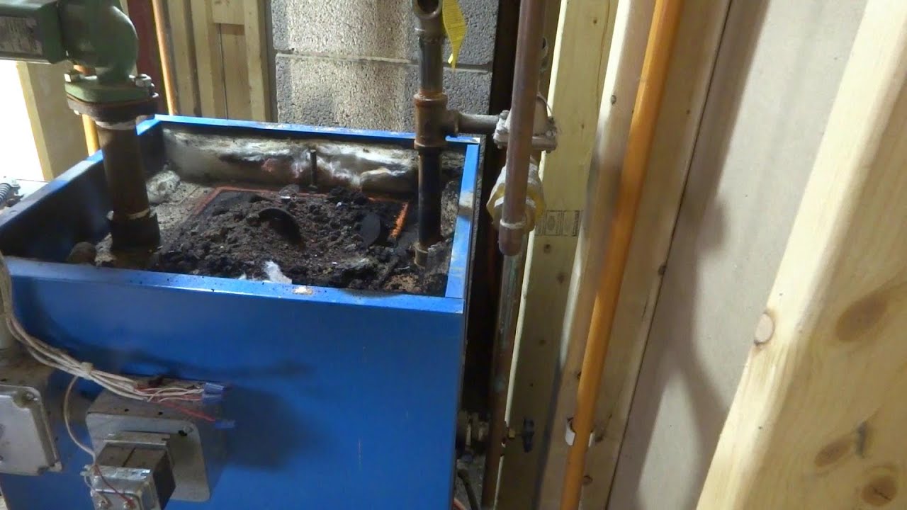 OIL BOILER FULL OF BLACK SOOT CAN I HELP