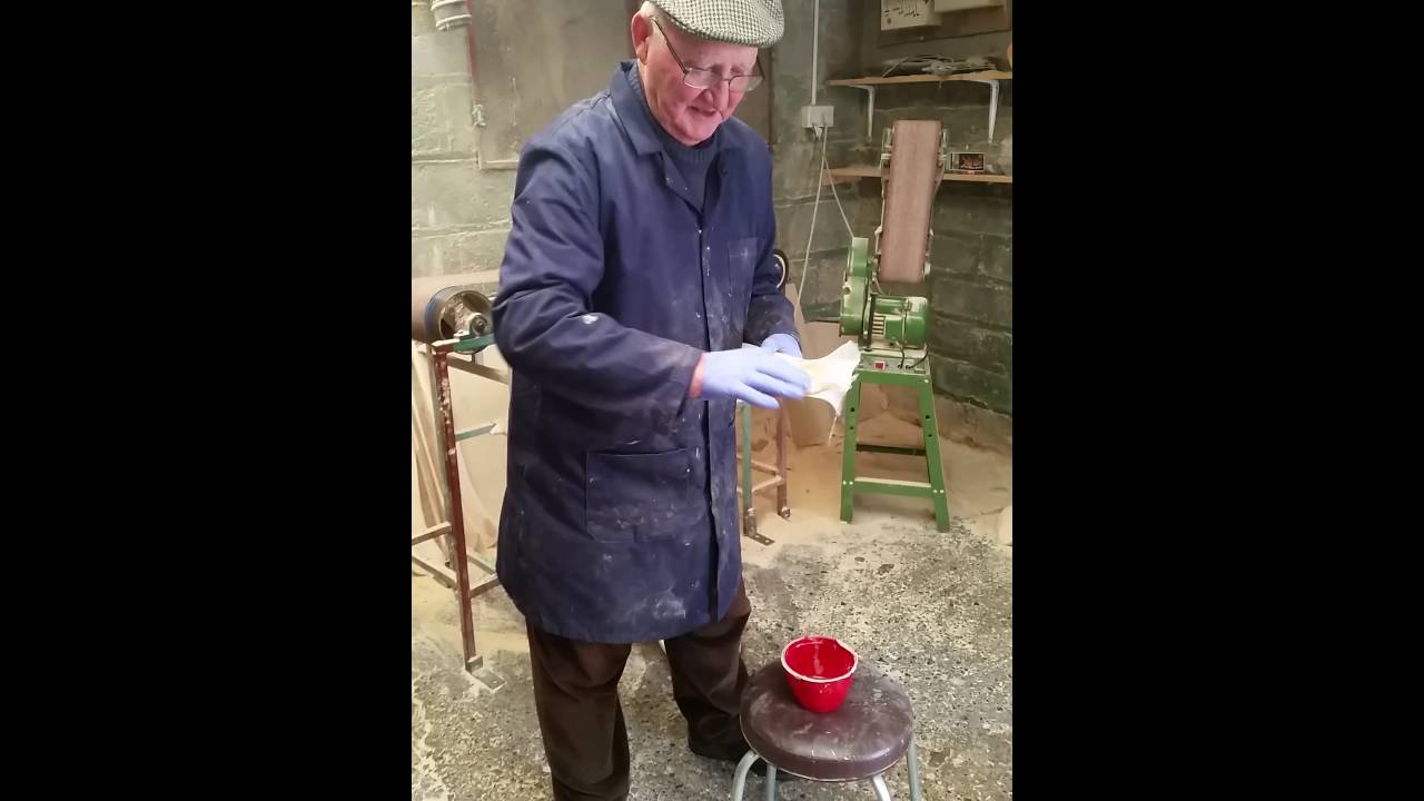 Martin Dunne fiberglasses a hurley