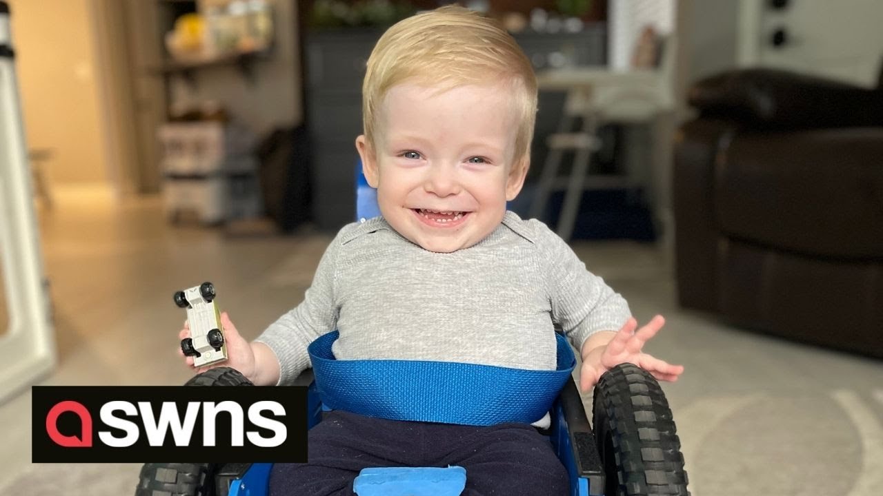 US toddler with spina bifida has mastered the use of his tiny wheelchair | SWNS