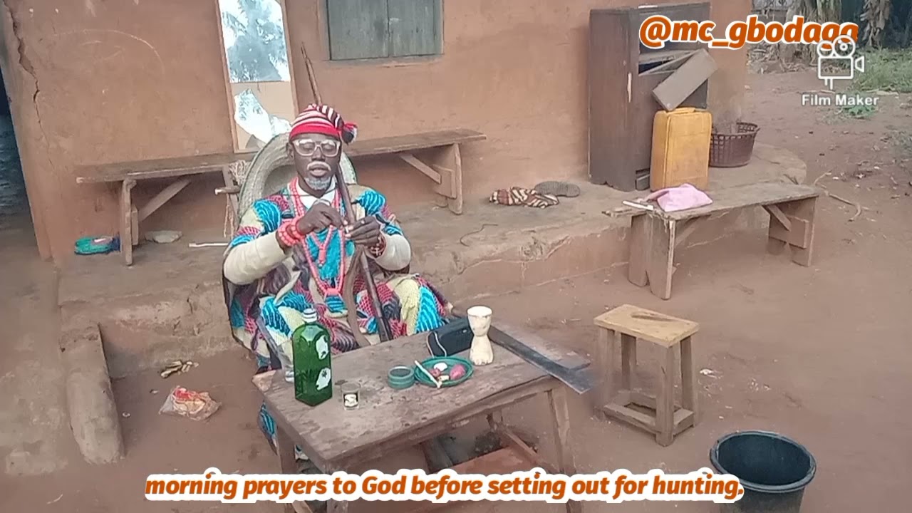 Morning prayer before heading for hunting for bush meat for Christmas celebration