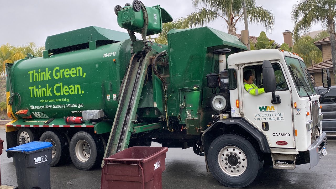 Fast Revving Waste Management Peterbilt 320 Amrep ASL Garbage Truck