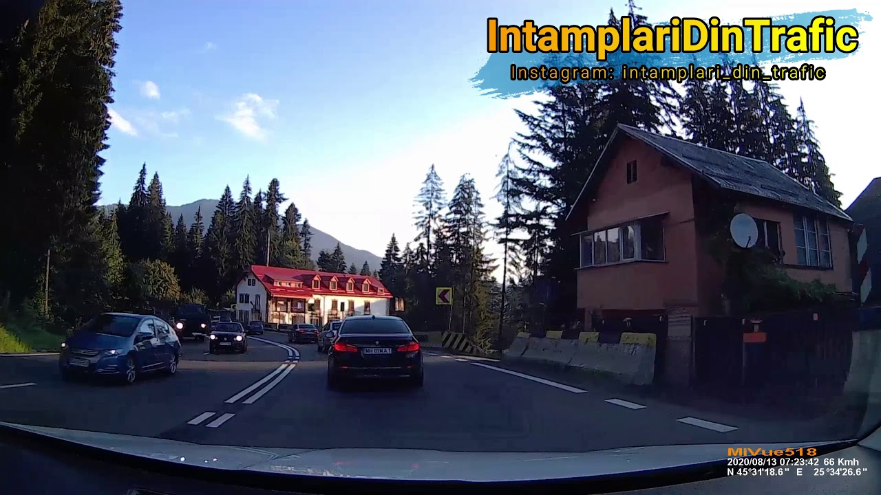 BMW in depasiri pe linie continua si curbe