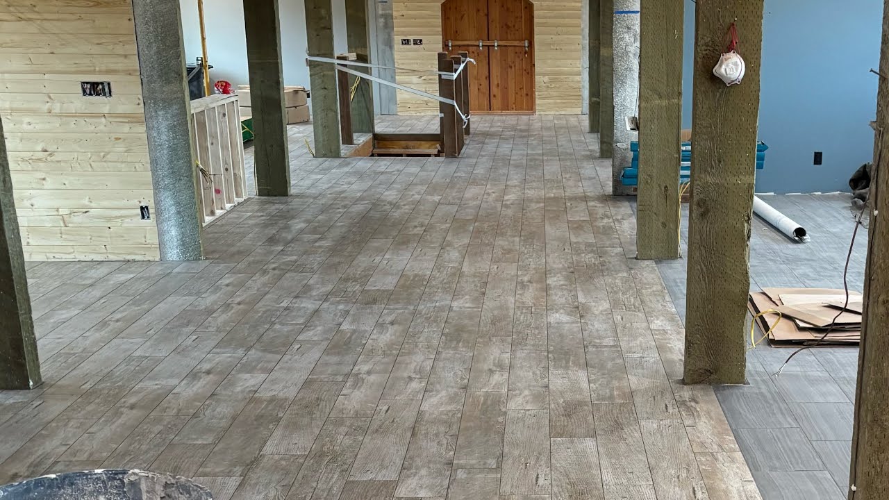 Tiling 2400 s/f over a horse stable! #howto #install #tile 