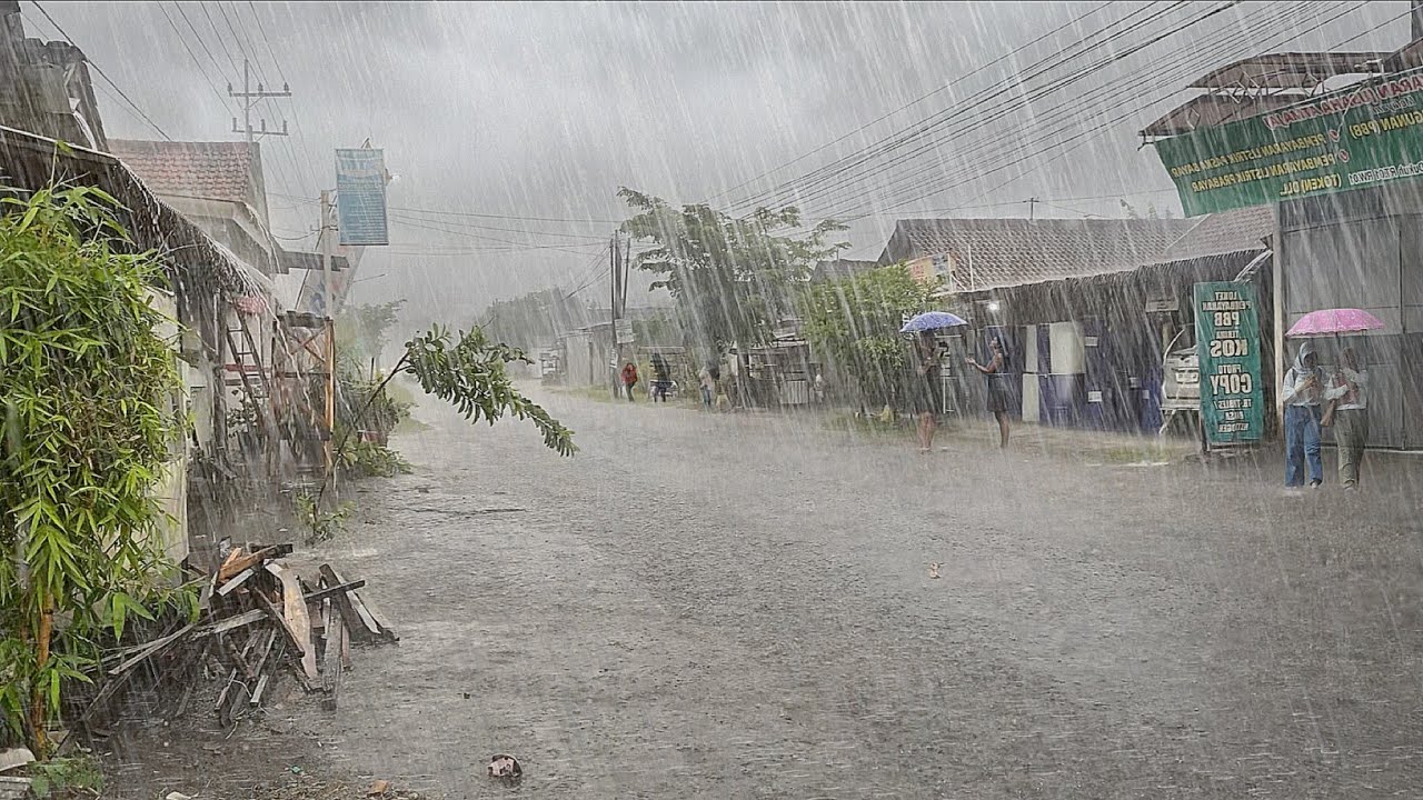 super heavy rainstorm in the village, strong and extreme rain in Asia, strong winds and lightning