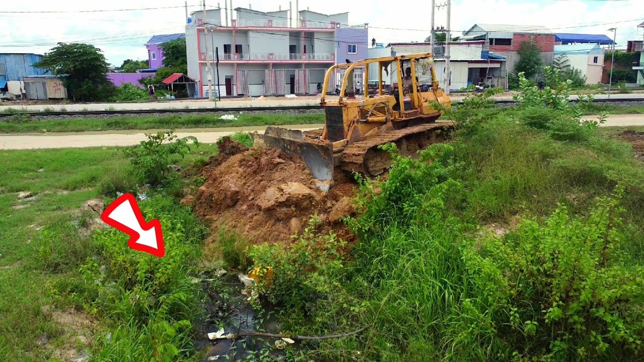 Starting A New Project Filling In Drain Pit!! Bulldozer Komatsu D58 Pushing Soil into Small drain.