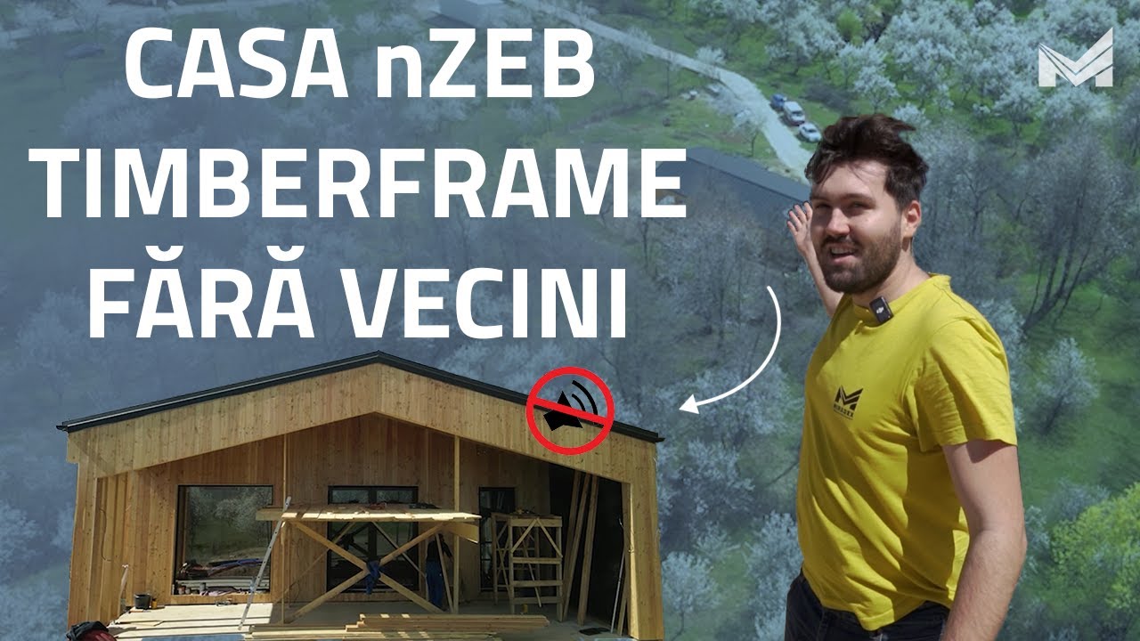 O casă TIMBERFRAME cu fațadă din lemn înconjurată de natură