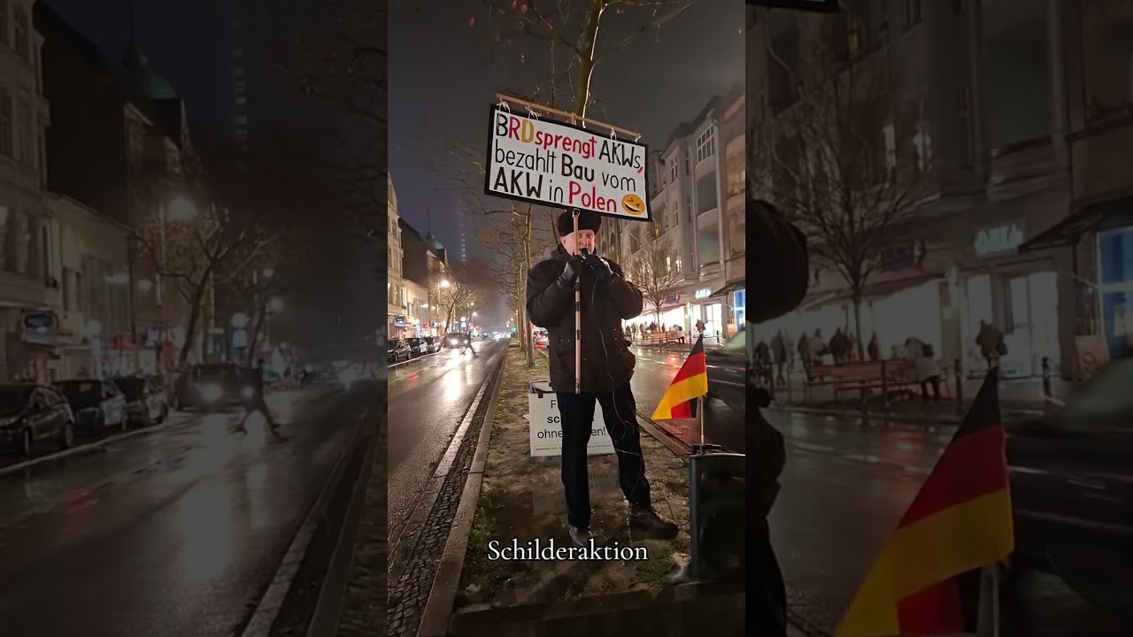 Menschen mit Schildern mit Bernd Pachal  er erklärt warum wir hier sind Unterstützung erwünscht!!