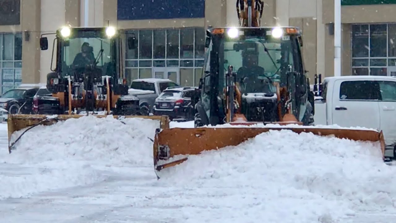Snow Removal Case 580 Backhoe Plowing Snow