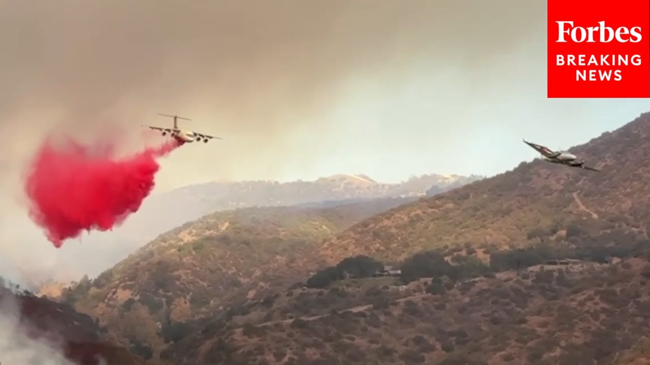 Firefighting Aircraft Conduct Water Drops As They Continue To Fight Palisades Fire