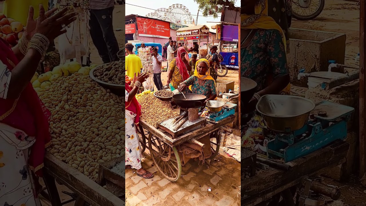 Street stall selling roasted peanuts at the Pushkar Camel Festival, India.