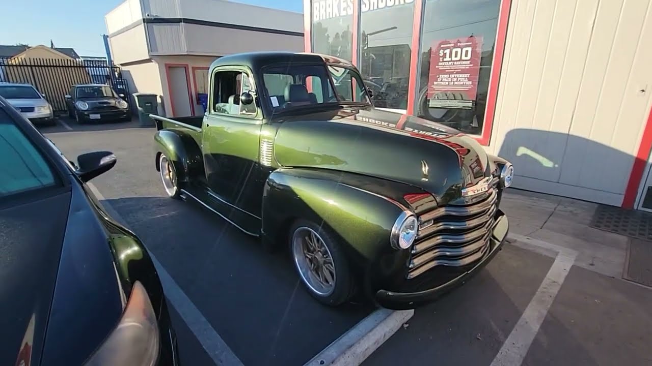 1948 Chevy 3100 5 Window.       1965 Cadillac Coupe De Ville.