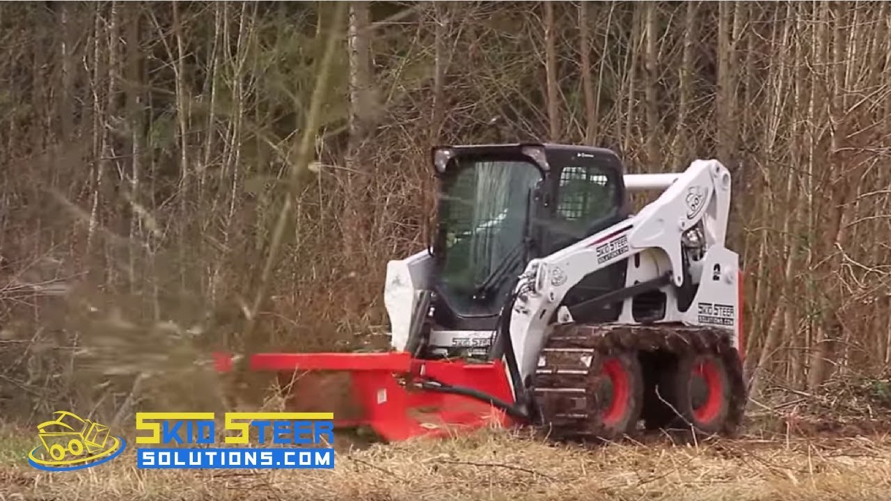 Tree Clearing Brush Cutter for Bobcat Style Loaders - Removing Trees with the Eterra Typhoon