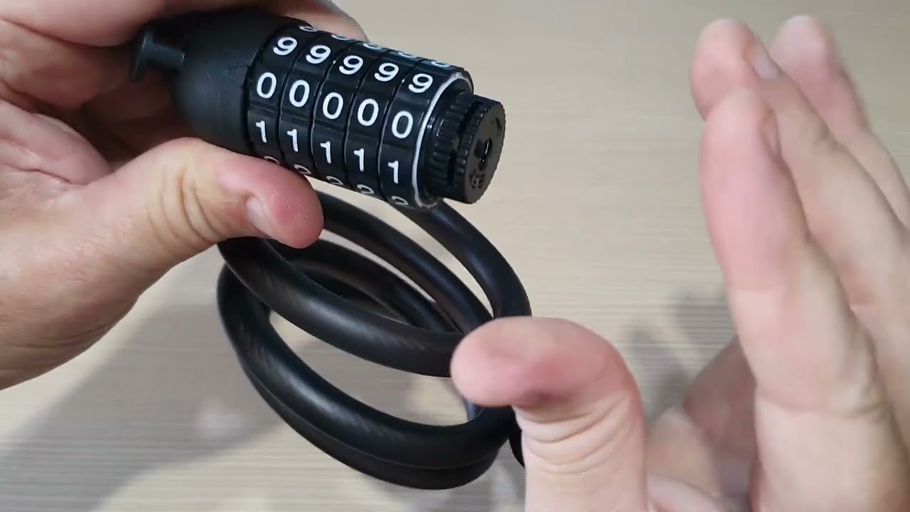 Candado de combinación para bicicleta, Un poco pesado y algo corto, pero no ocupa mucho