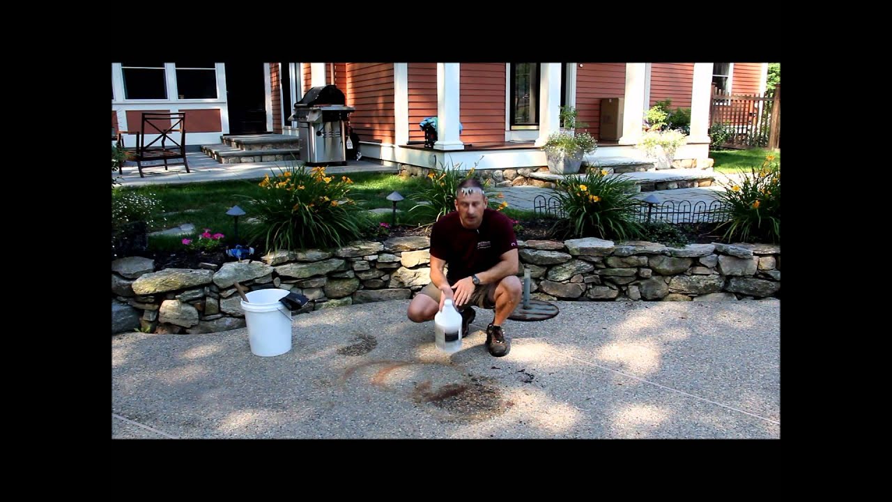 Muriatic acid removing a rust stain From concrete 1