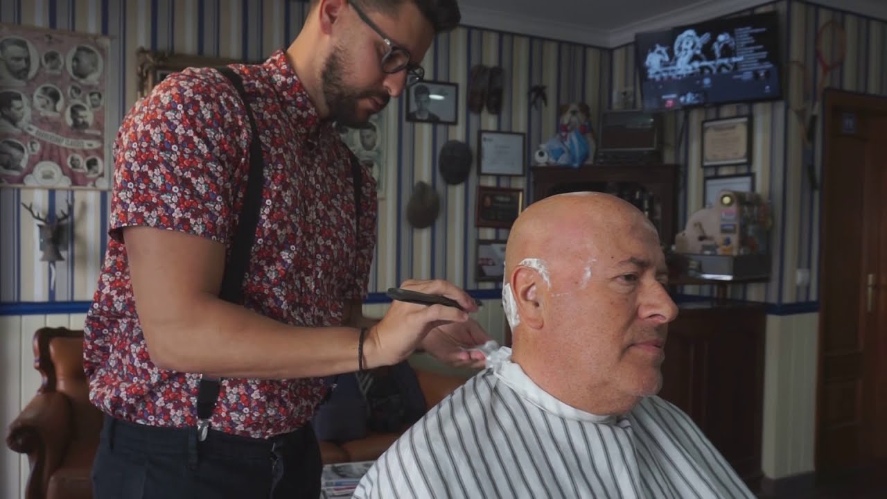 Indulge in a Luxurious Hot Towel Head Shave: A Masterful Grooming Experience