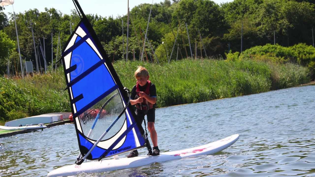 Eerste windsurfles Alex