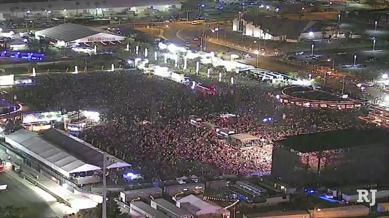 People flee the Route 91 Harvest festival on Oct. 1, 2017