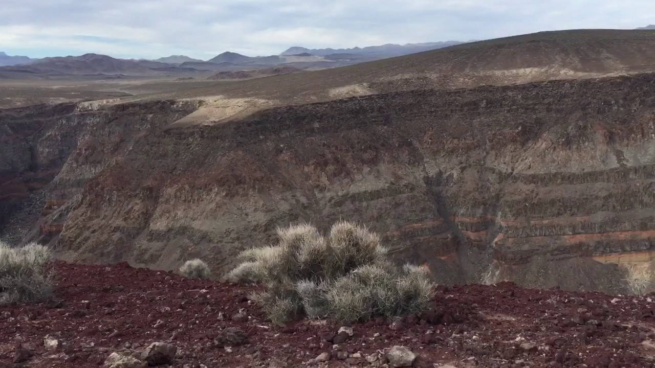 Navy Fighter Jet Flies Through Rainbow Canyon, Death Valley