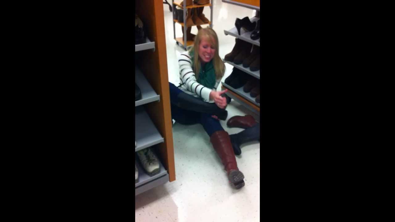 Kayla's foot gets stuck in a boot