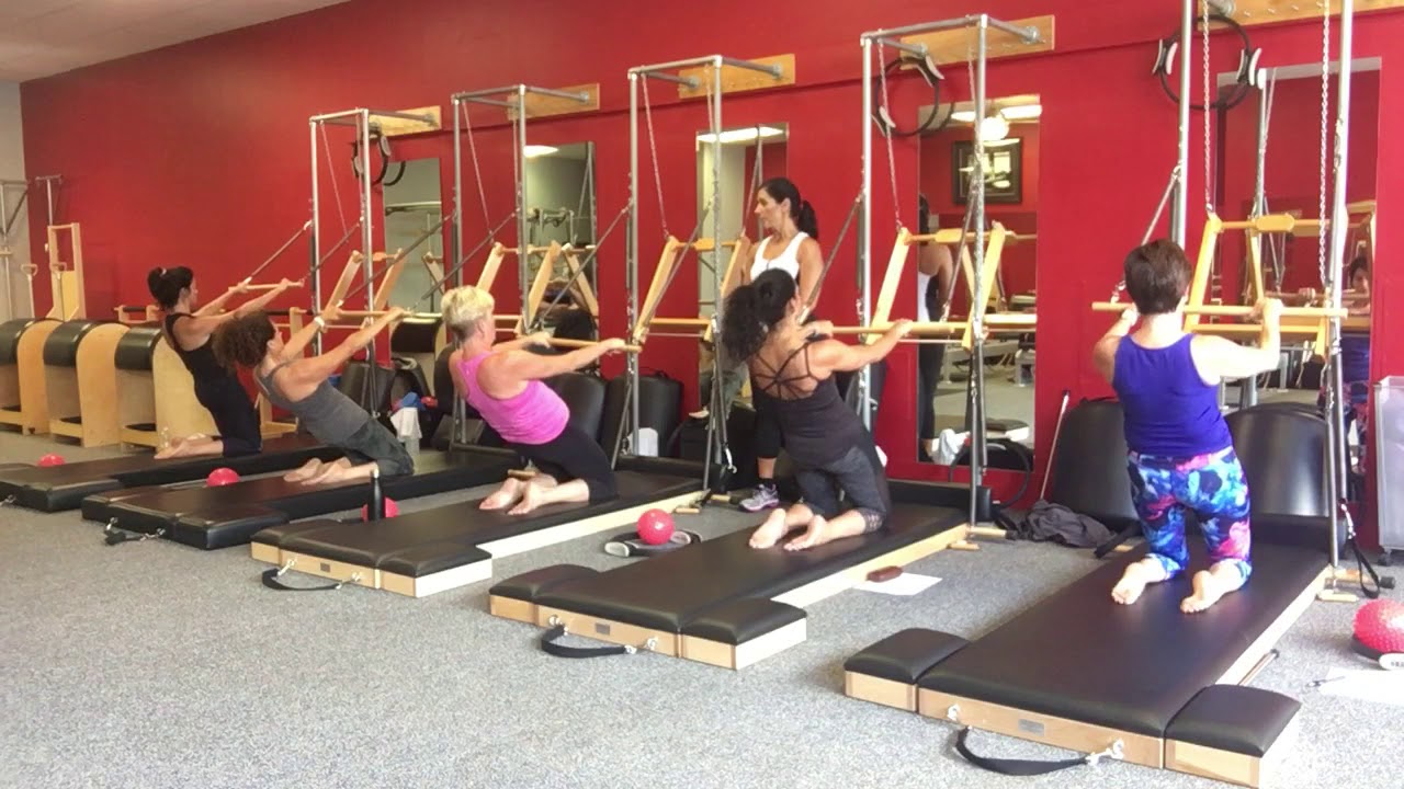 Roll back bar Variations on the Pilates Tower