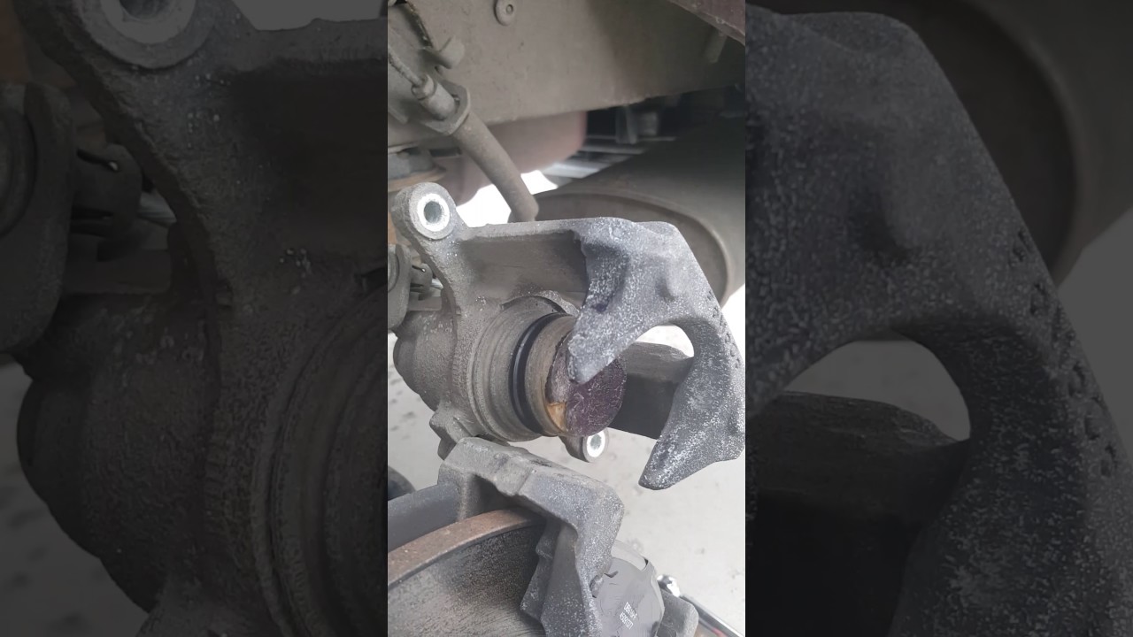 How to push in Ford brake piston