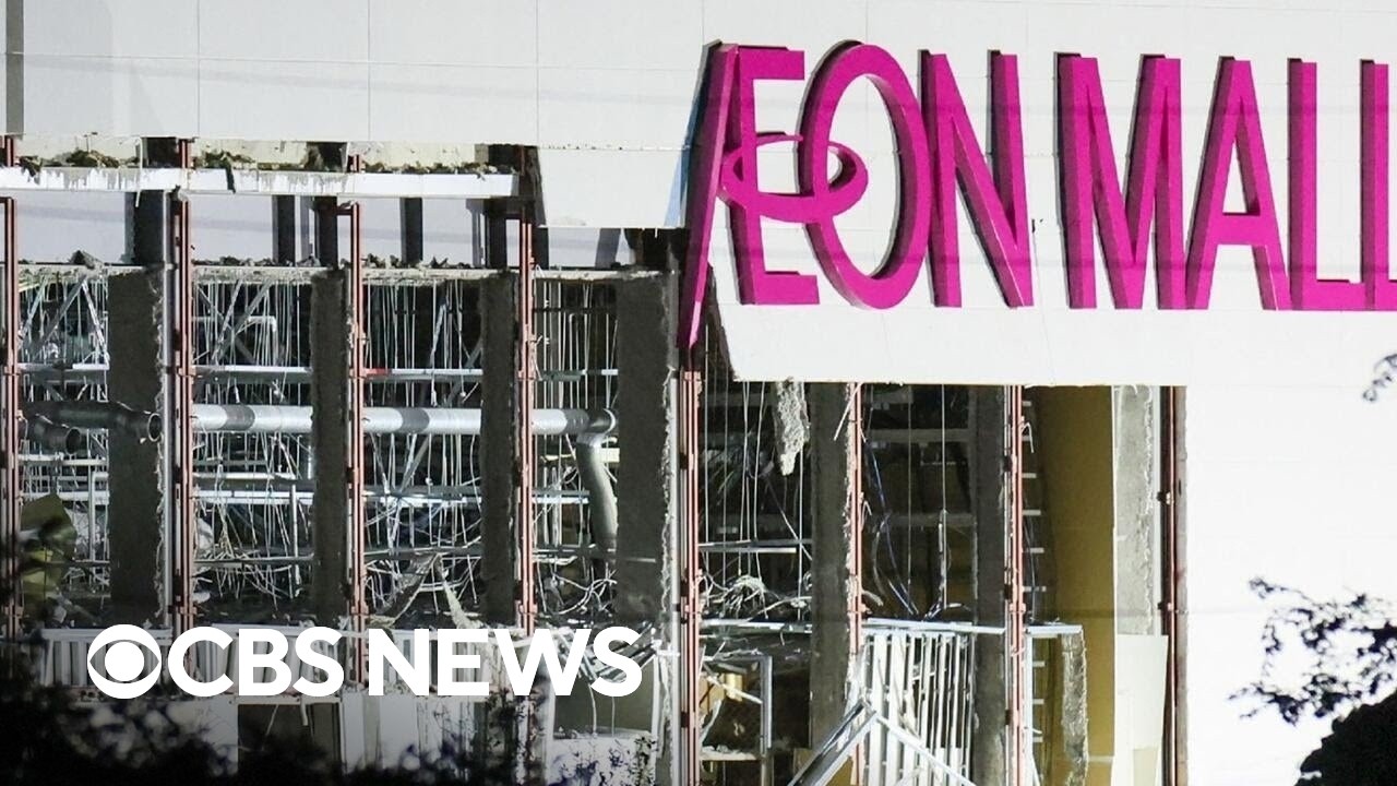 Japanese earthquake rescue workers race against time to find survivors at devastated mall