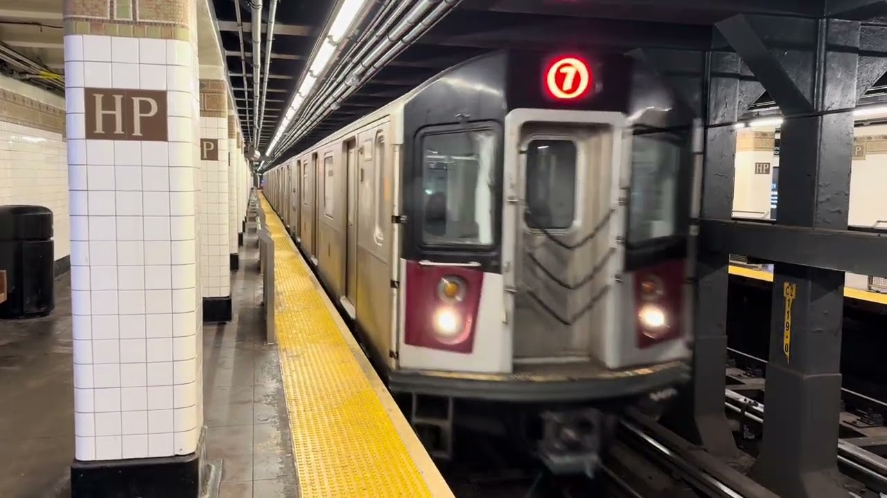 IRT Flushing Line: R188 subway cars on the 7 line at Hunterspoint Avenue