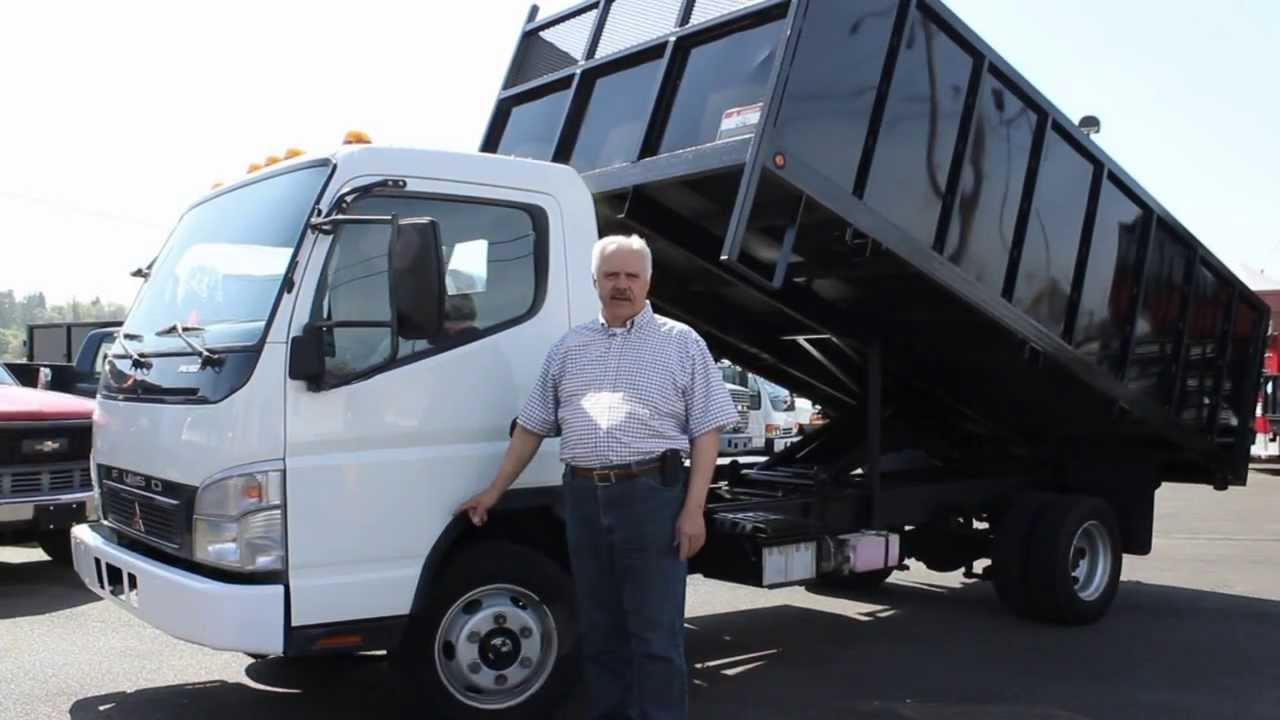Town and Country Truck #5824: 2007 Mitsubishi Fuso FE180 16 Ft. Flatbed Dump Truck