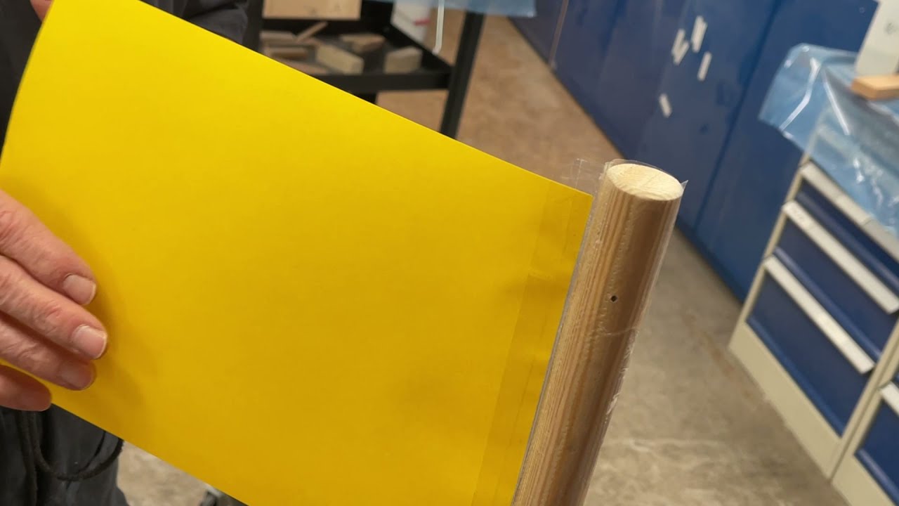 Poor mans wing mast. By turning the sail track to the lee side turbulence is reduced.