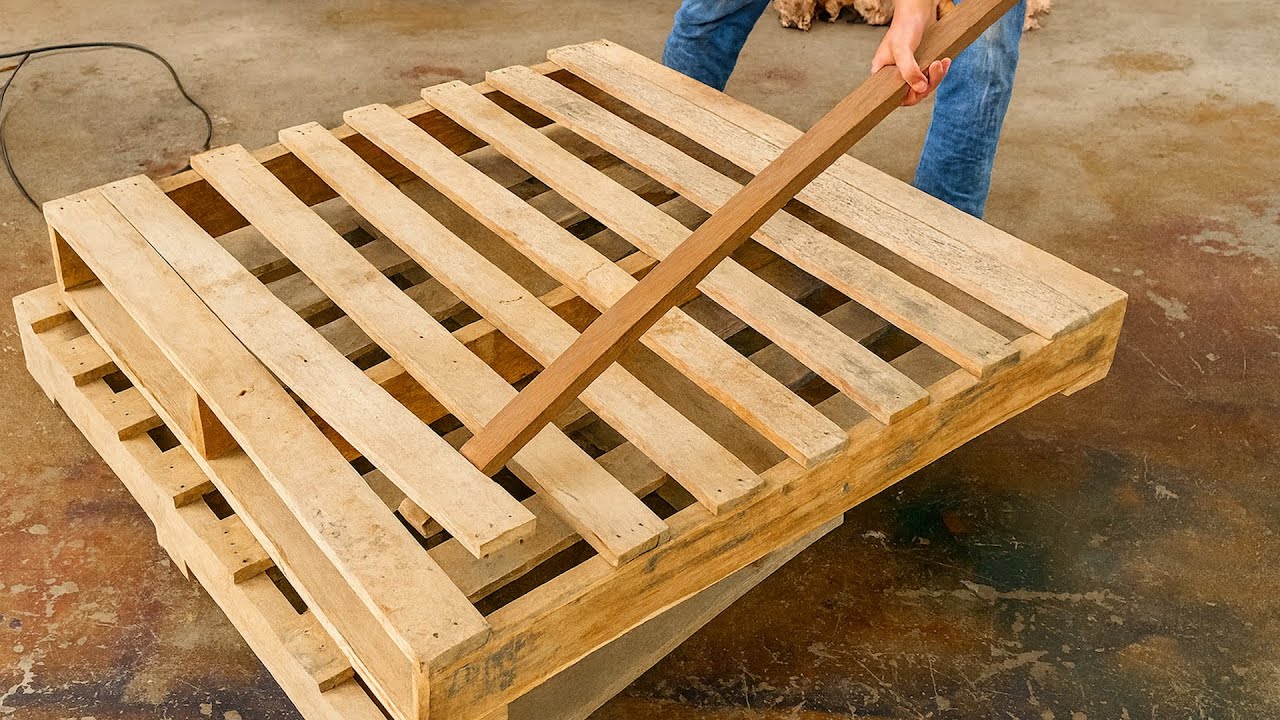 The Skillful Hands of a Talented Carpenter  Crafting a Coffee Table from Scrap Pallets