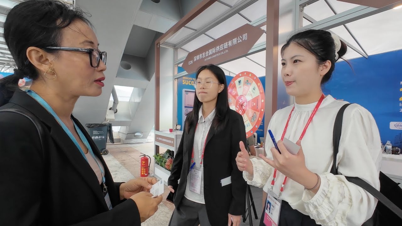 Talking with shipping companies at the Canton fair, Guangzhou, China