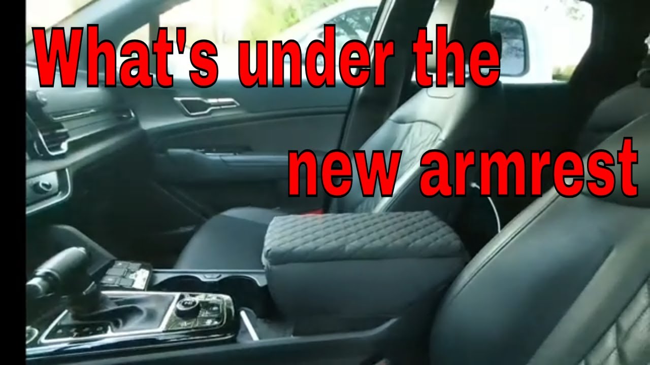 Kia Sportage Armrest cover secret compartment