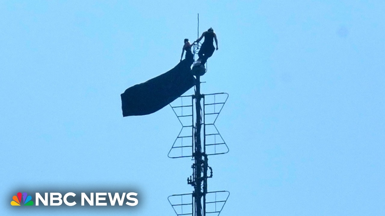 Full Special Report: Two trespassers climb the Empire State Building spire