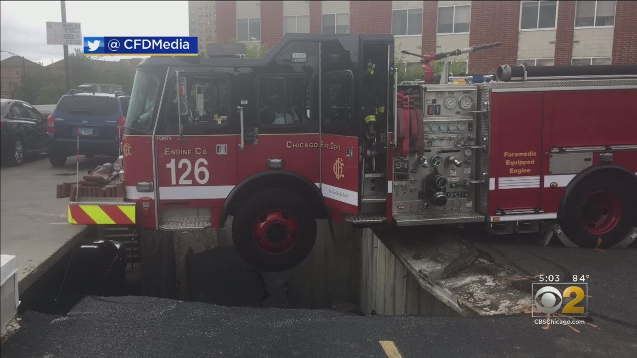 Crane Arrives To Help Remove Chicago Fire Engine From Collapsed Parking Garage